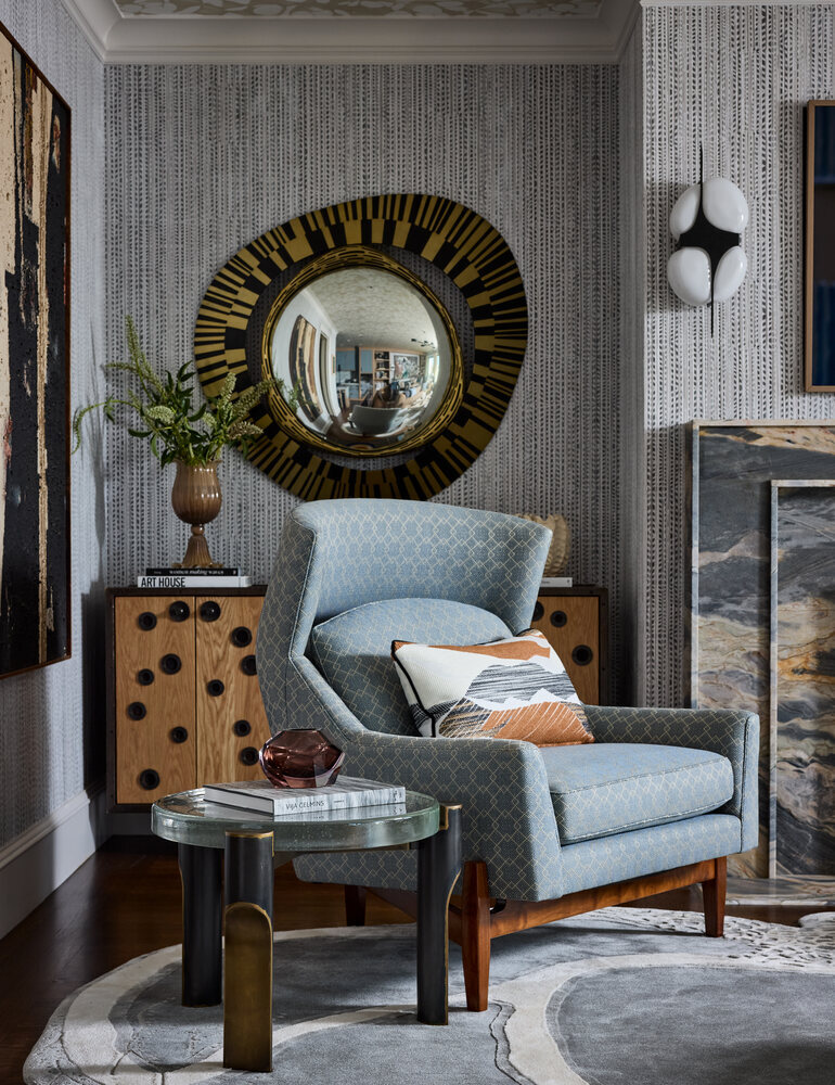 Cozy reading nook with statement mirror and armchair in Tiburon custom home by S.A. Baxter, Inc.