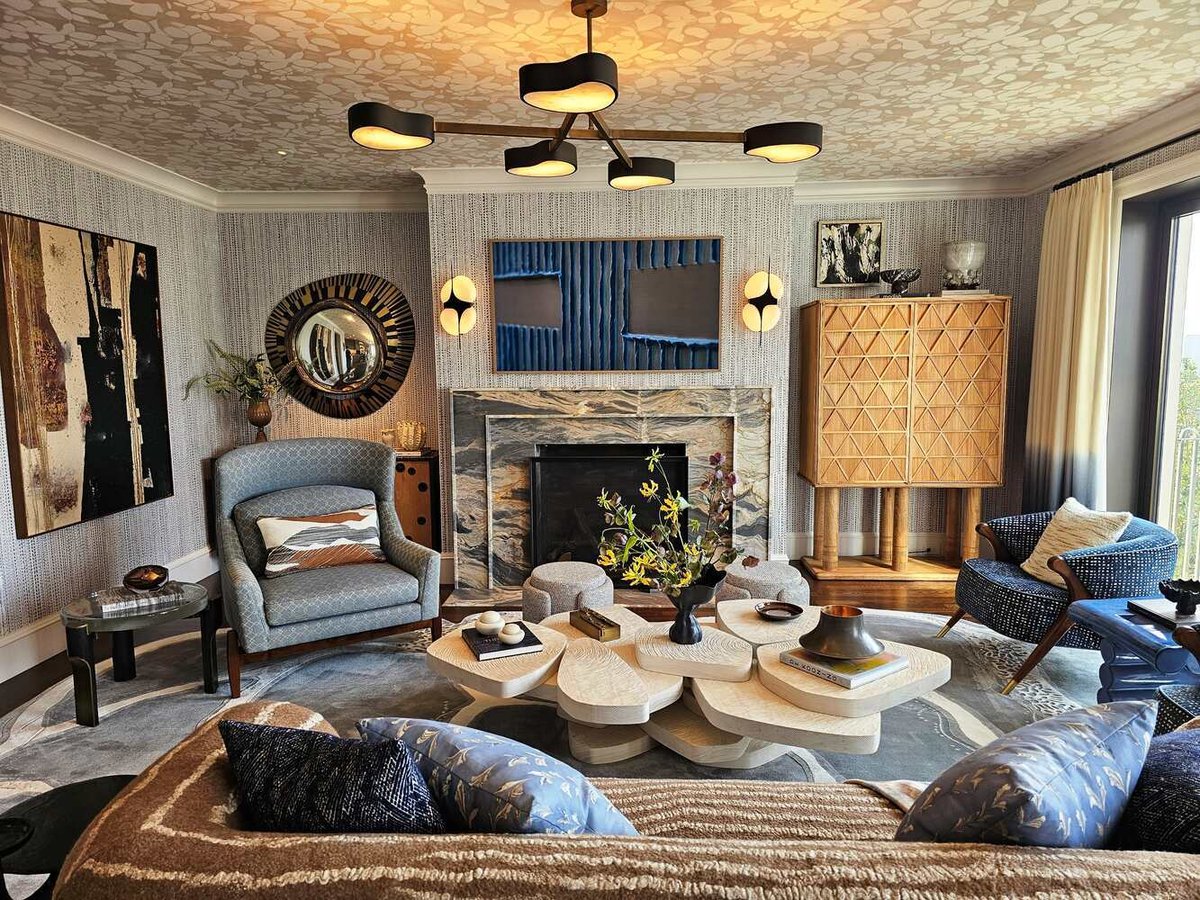 Stylish living space featuring geometric chandelier and artistic accents in a San Francisco custom home by S.A. Baxter, Inc.