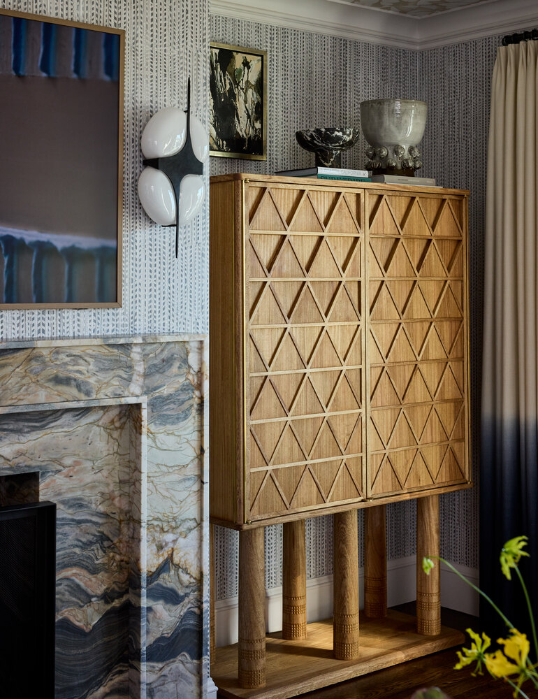 Unique freestanding wood storage unit in luxury San Francisco custom home by S.A. Baxter, Inc.