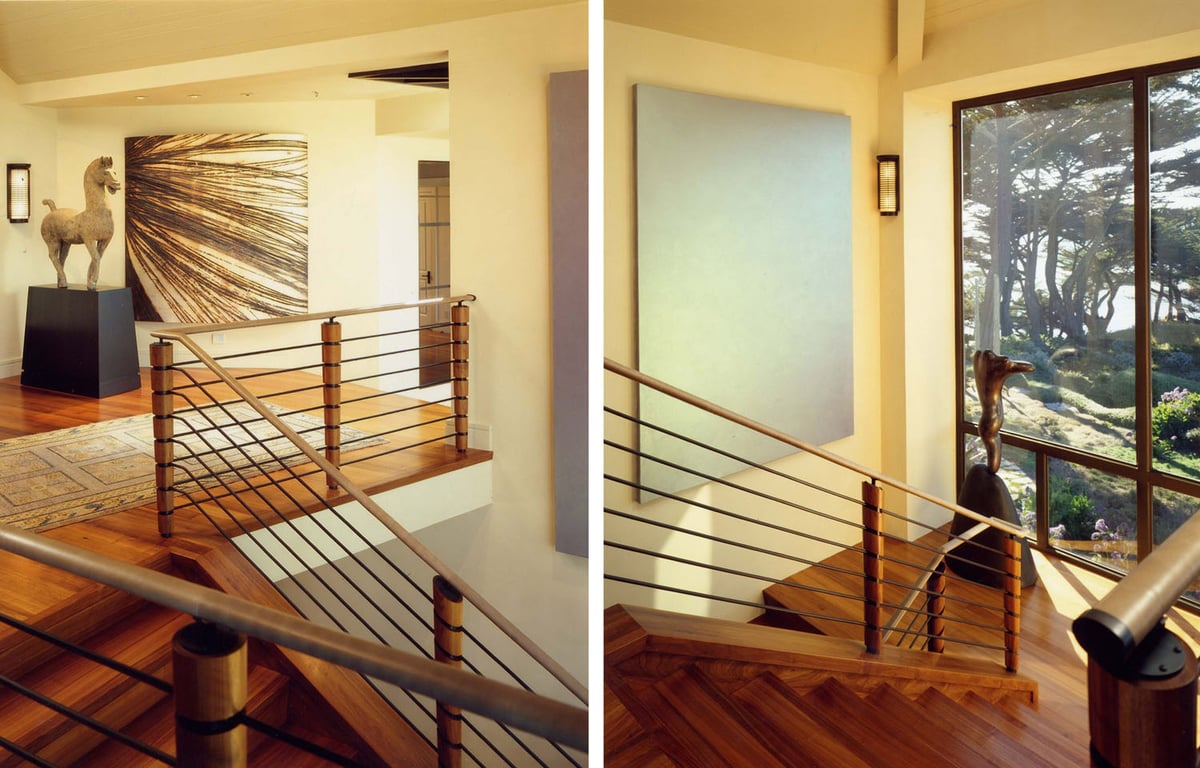 Artful stairwell framed by expansive windows and elegant finishes by S.A. Baxter, Inc. in Carmel Highlands, CA.