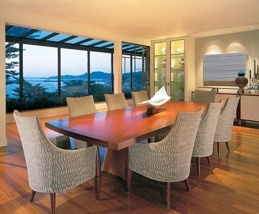 Elegant dining room with wall-to-wall ocean views and contemporary design by S.A. Baxter, Inc. in Carmel Highlands, CA.