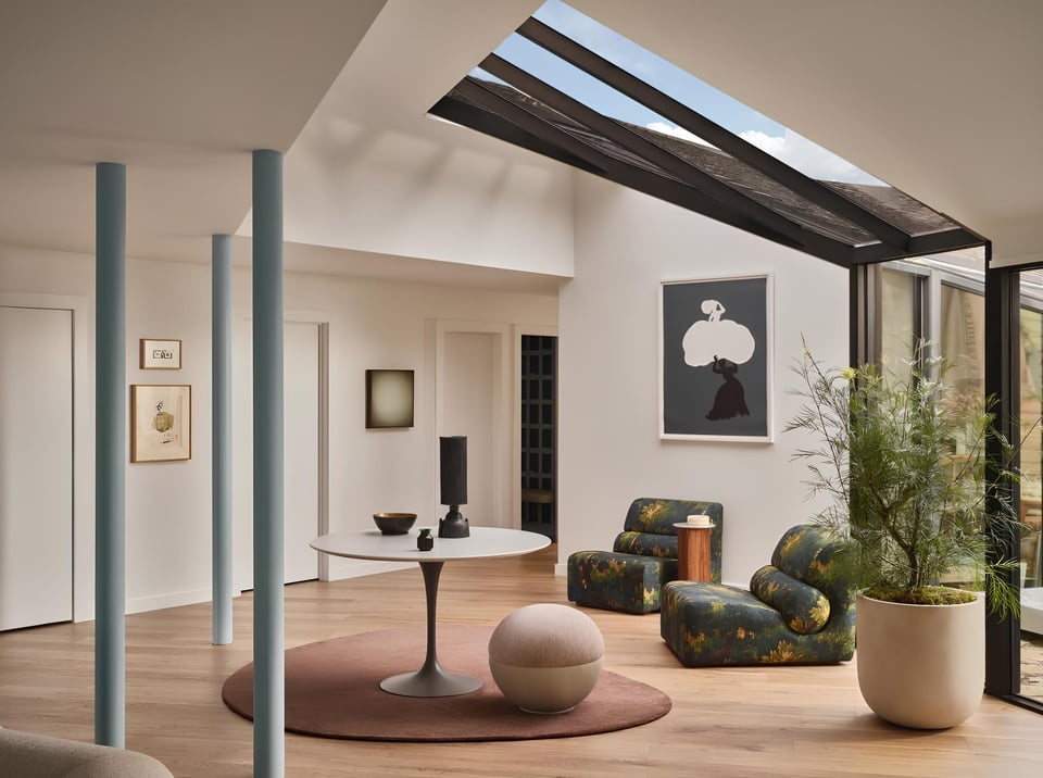 Lounge area under glass ceiling with modern decor in custom Marin County home by S.A. Baxter, Inc.