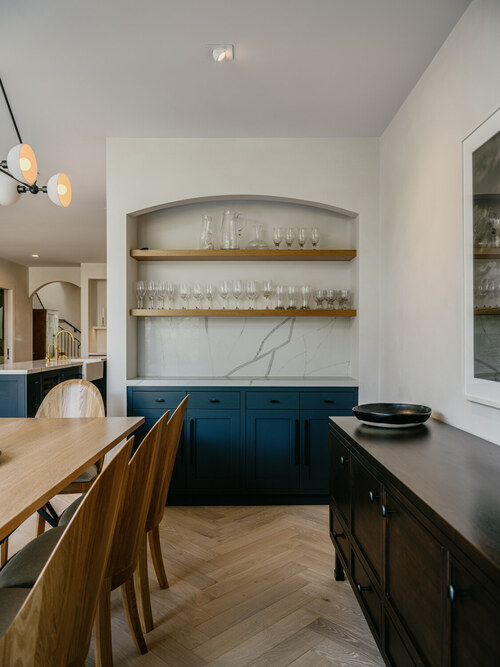 Dining area with custom cabinetry and glassware display in Marina District home by S.A. Baxter, Inc.