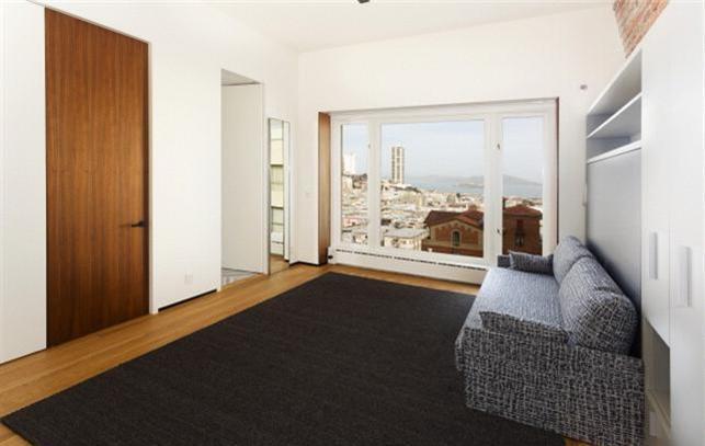 Custom-built room with large window and skyline view in Nob Hill, CA by S.A. Baxter, Inc.