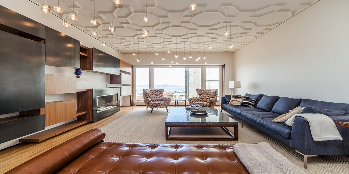 Living room with patterned ceiling and large windows in custom Nob Hill home by S.A. Baxter, Inc.