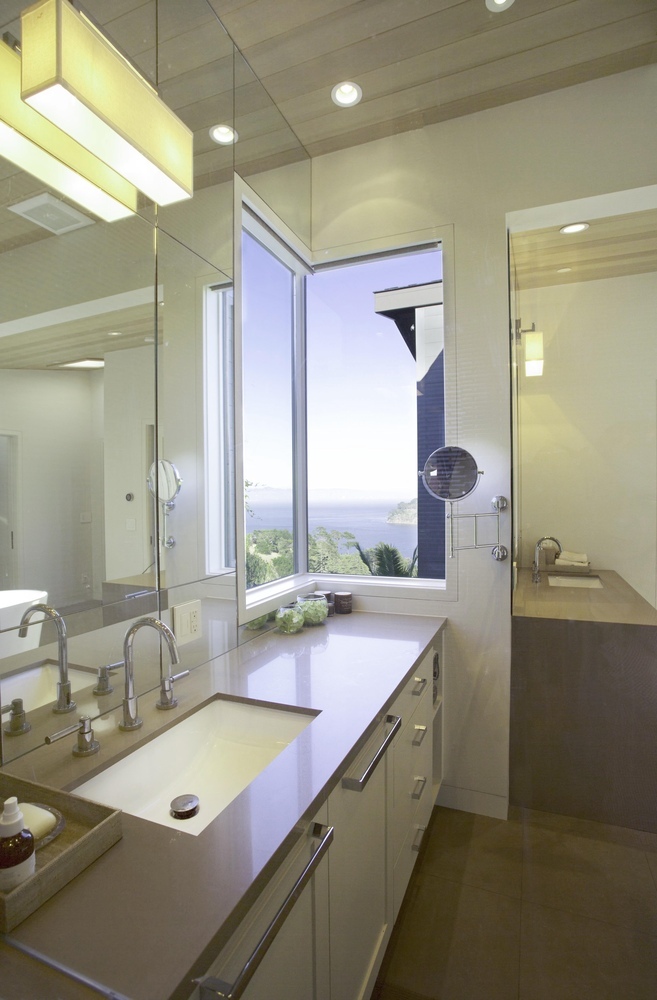 Ocean view from bathroom corner window in Tiburon home by S.A. Baxter, Inc.